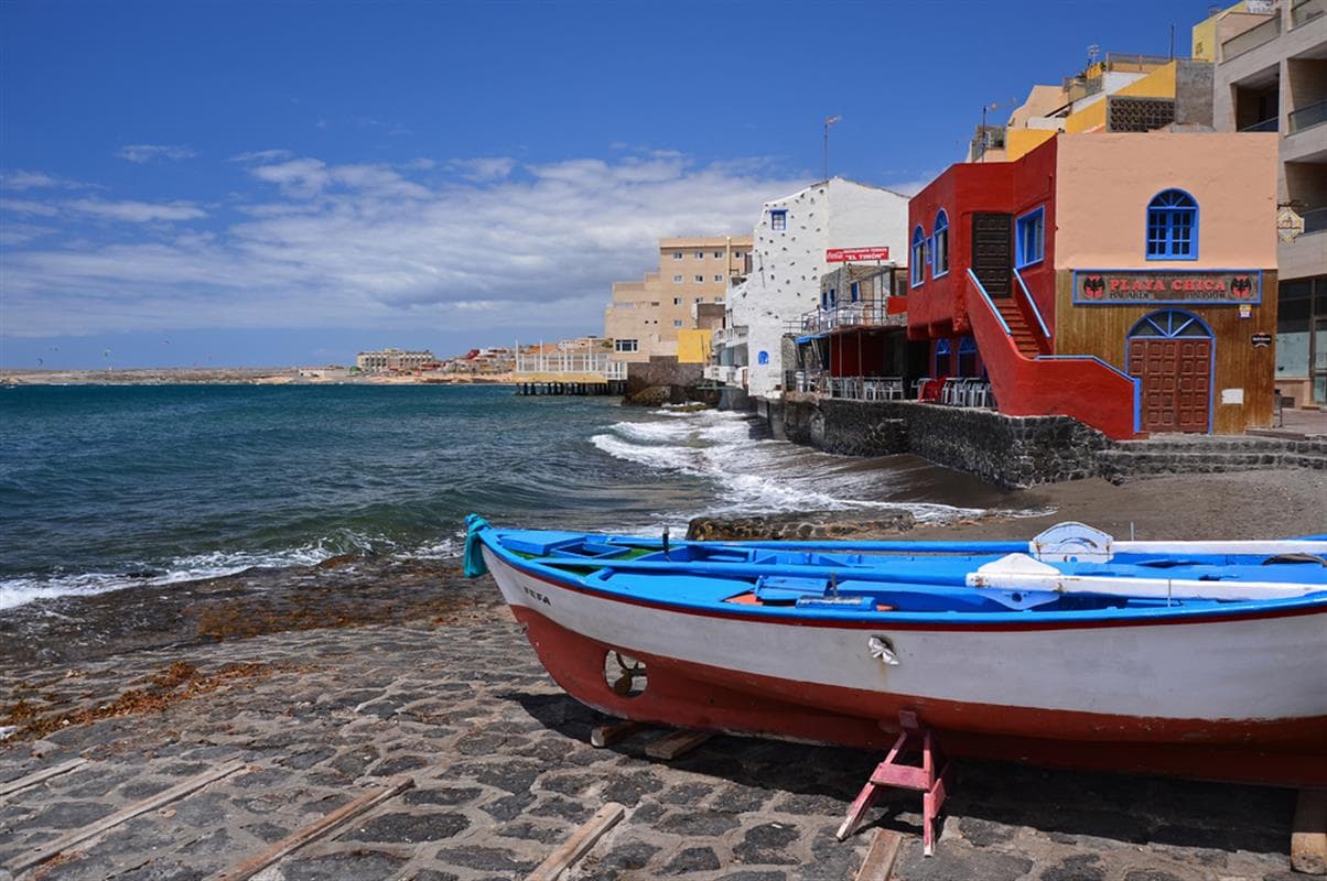 Typical fishing boats at Playa Chica on the El Médano promenade